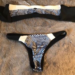 Snakeskin bikini fits like a S